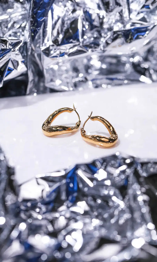 Paul Valentine Molten Twisted Hoops Bis zu 60% Rabatt