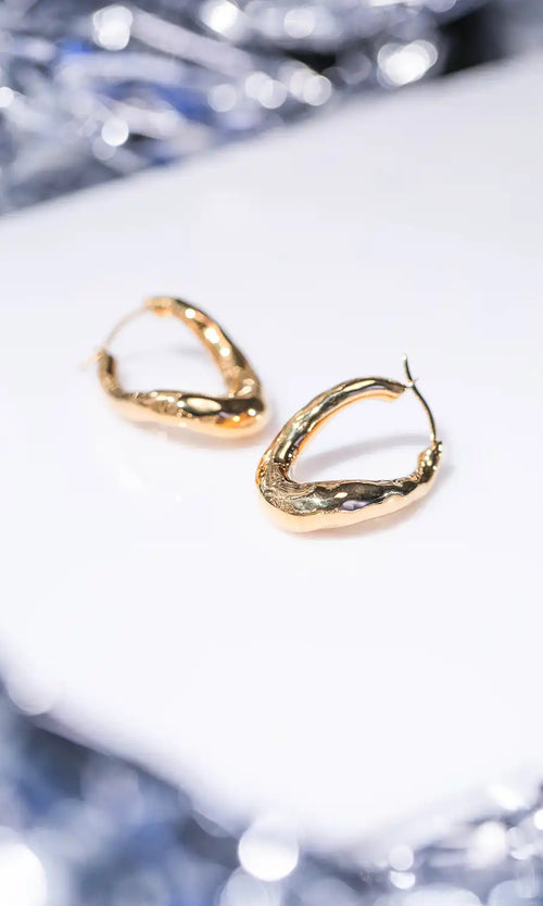 Paul Valentine Molten Twisted Hoops Bis zu 60% Rabatt