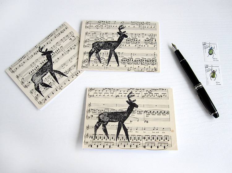 Renna Deluxe Klappkarte mit Hirsch auf Notenpapier Sonderangebot der Fabrik