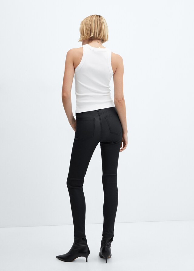 Mango Skinny Coated-Jeans mit hohem Bund Nur für heute