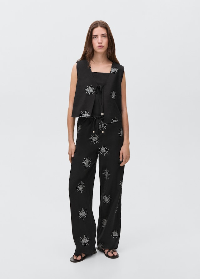 Mango Lange Hose mit Stickdetails Angebote