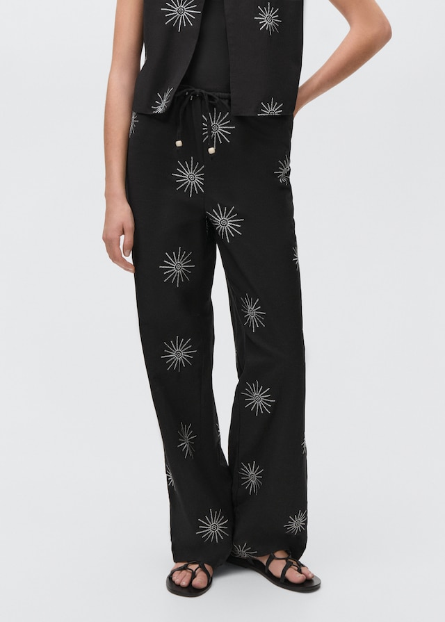 Mango Lange Hose mit Stickdetails Angebote